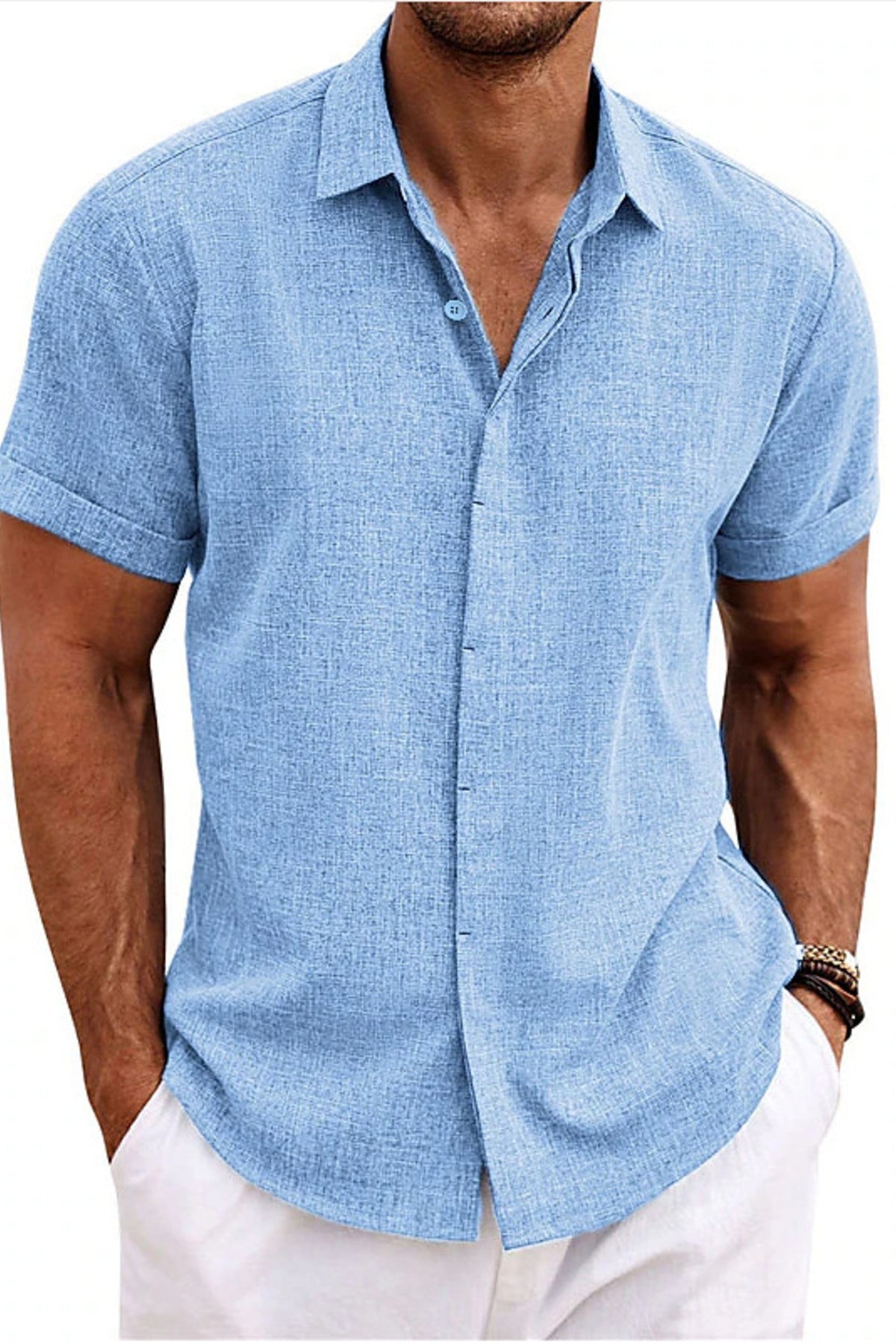 Man wearing a light blue short-sleeve shirt on a white background