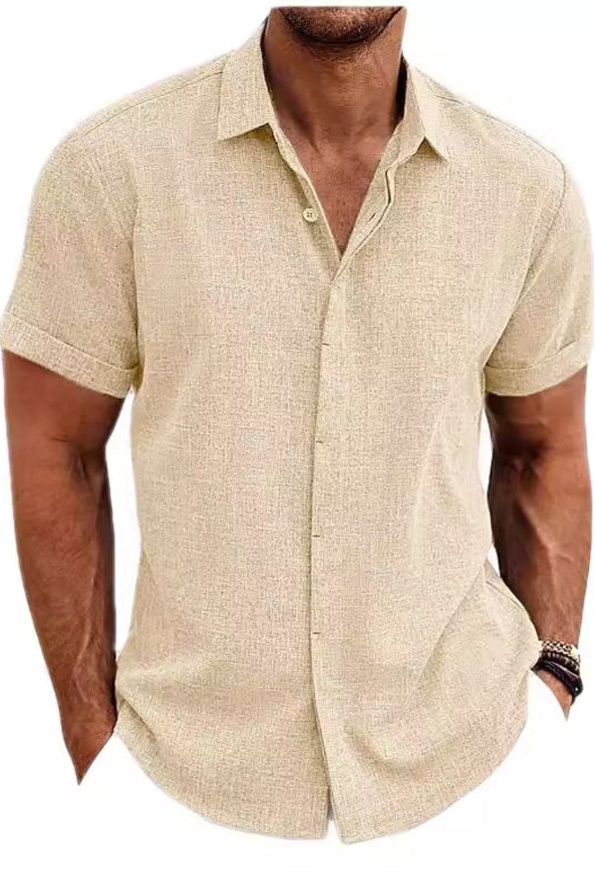 Man wearing a beige short-sleeve shirt on a white background