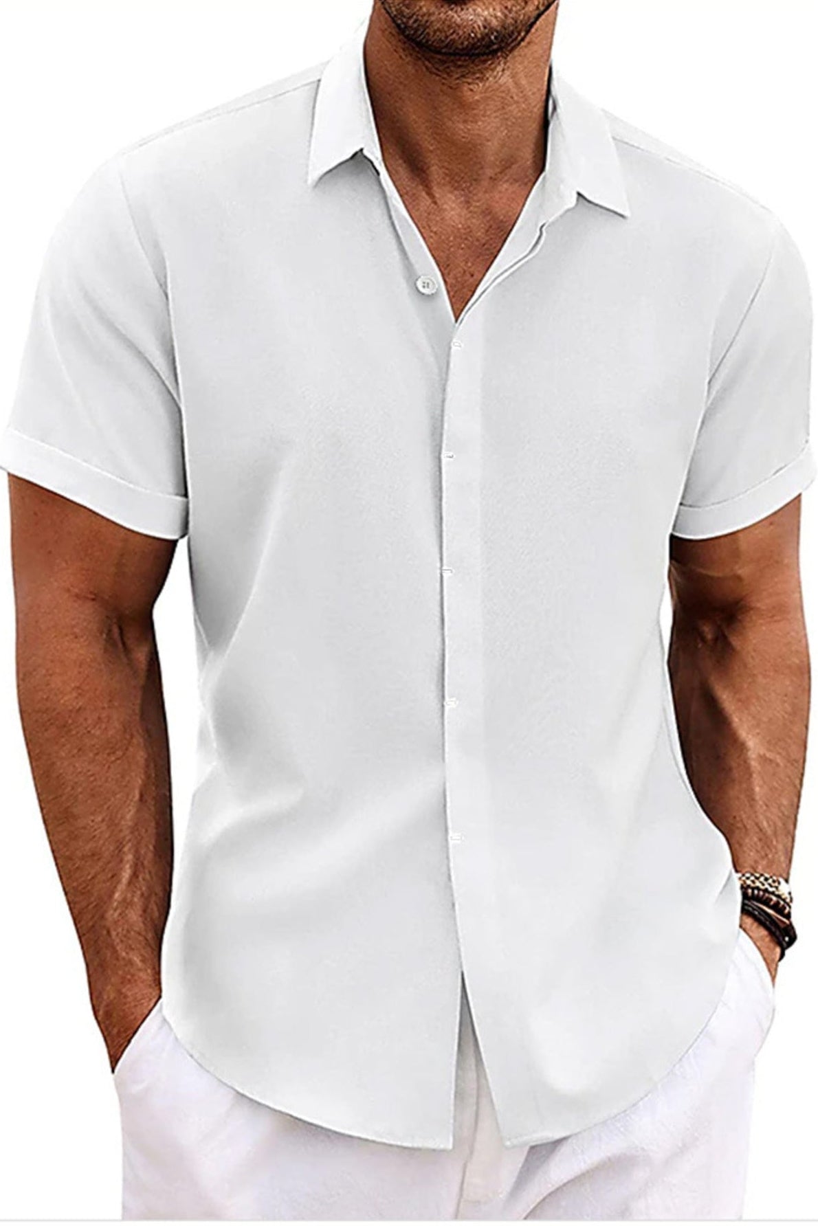 Man wearing a white short-sleeve button-up shirt on a white background
