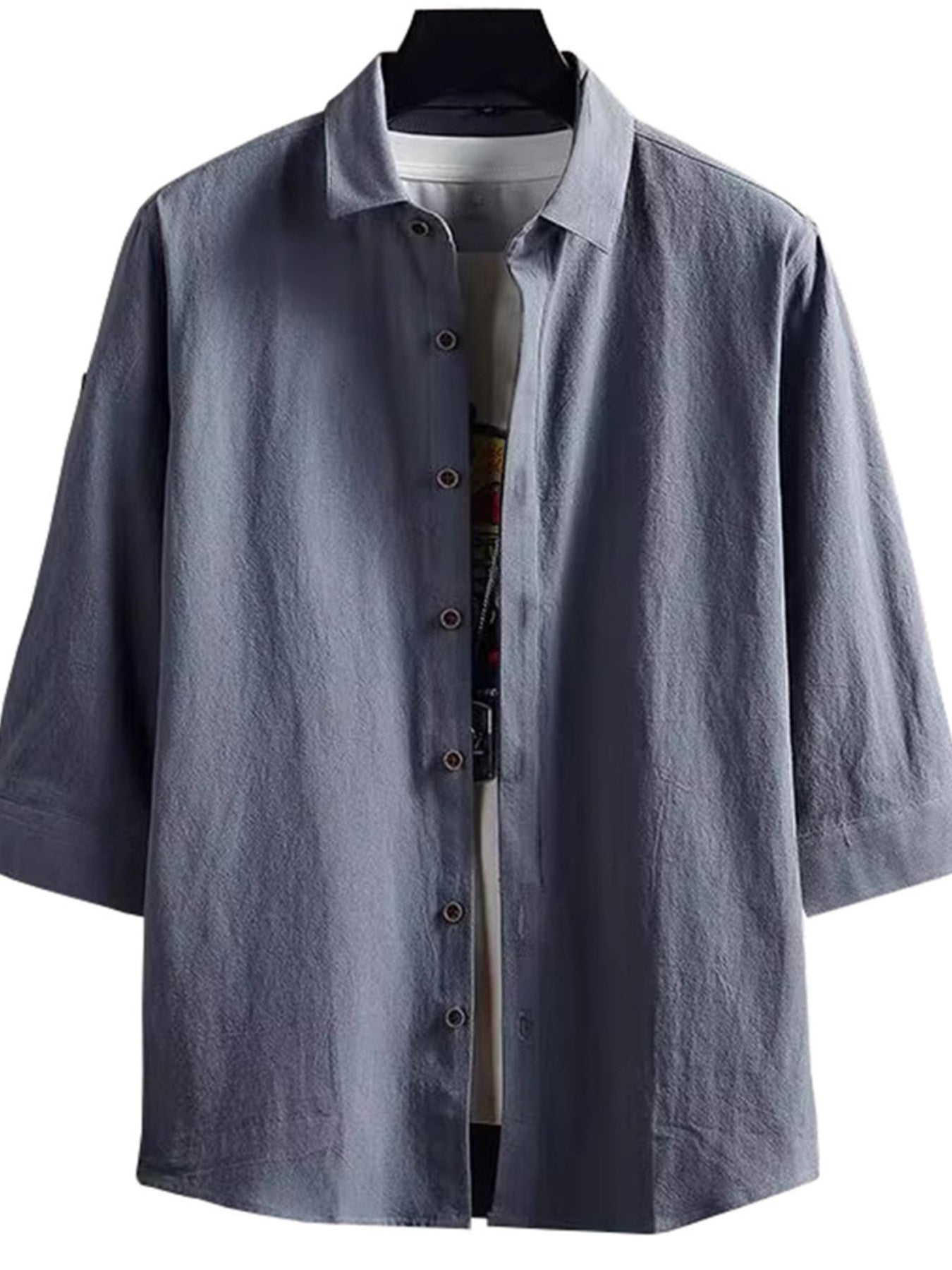Gray button-up shirt on a hanger with a white background