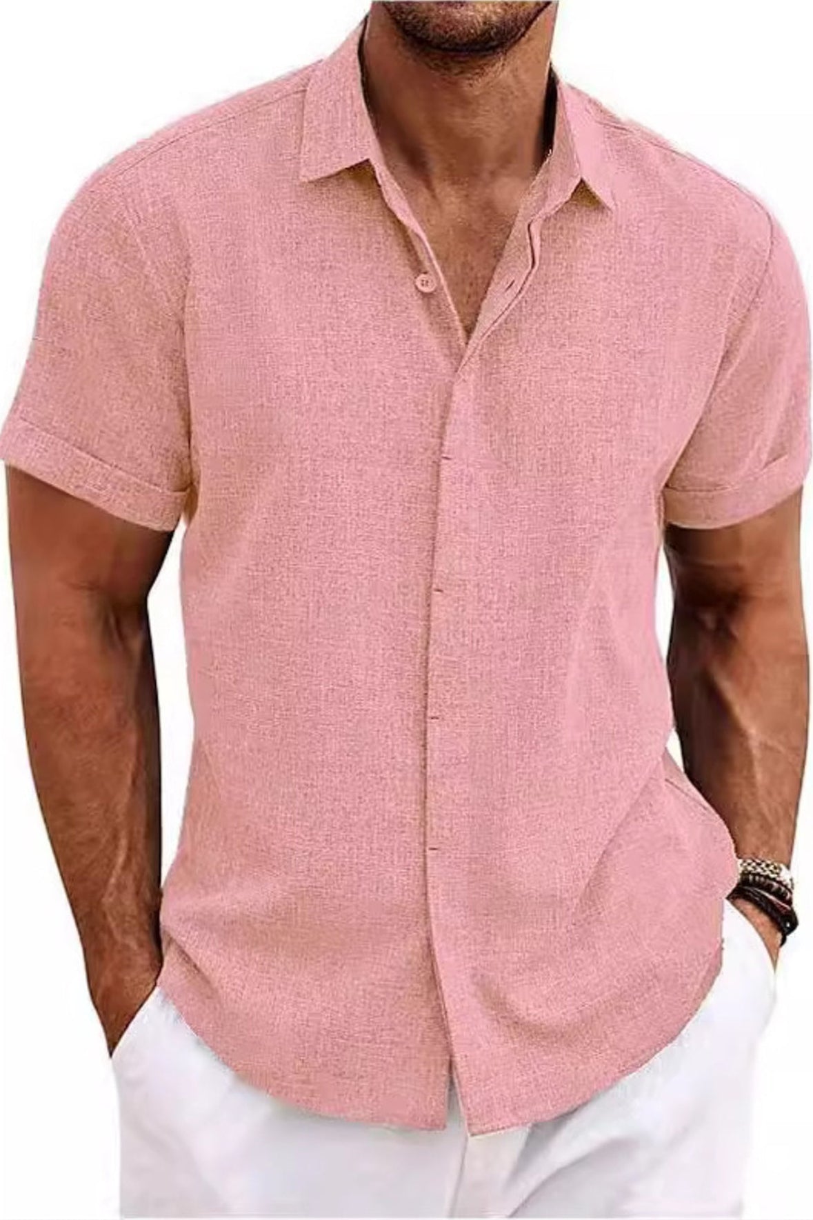 Man wearing a pink short-sleeve shirt on a white background