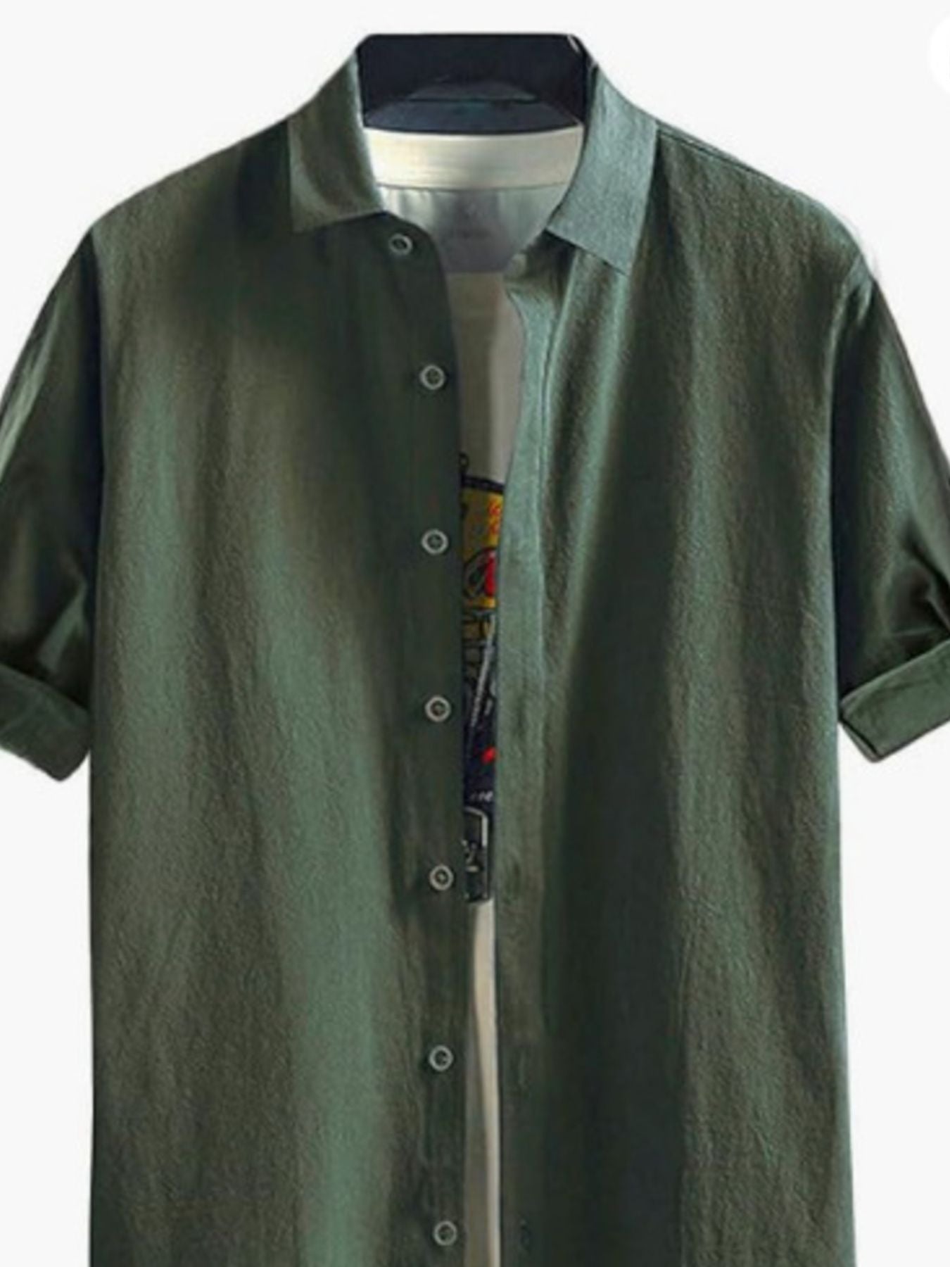 Green short-sleeve shirt with a collar on a white background