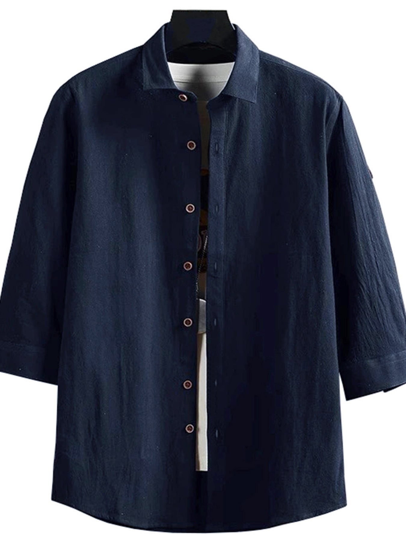 Navy blue button-up shirt on a white background