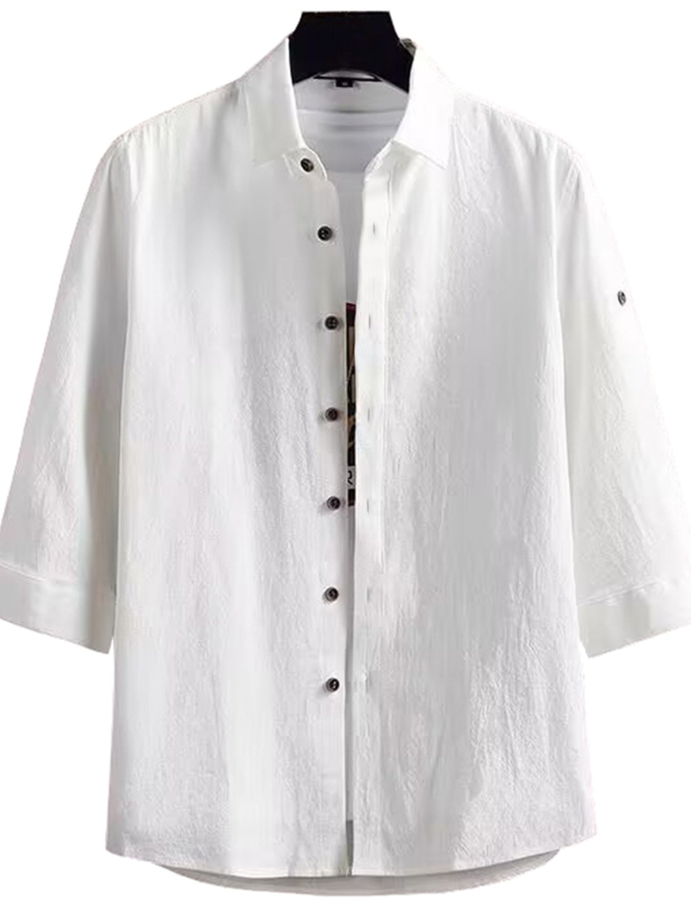 White shirt with black buttons on a white background