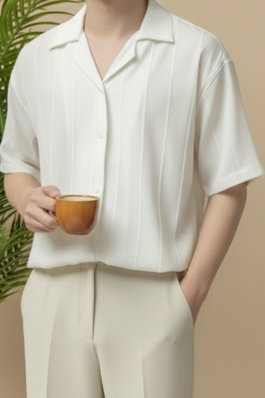 Men's casual loose fit short sleeve shirt in white - studio shot